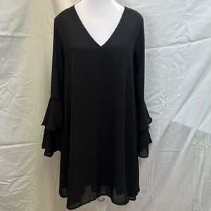 Altar’d State black v-neck dress with long bell sleeves.